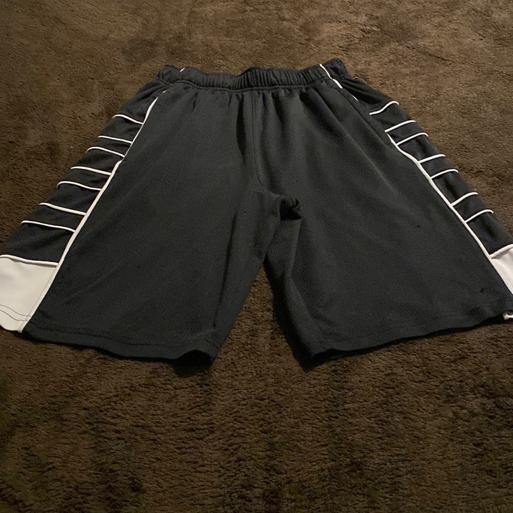 Men’s pony shorts, black with white piping, size small